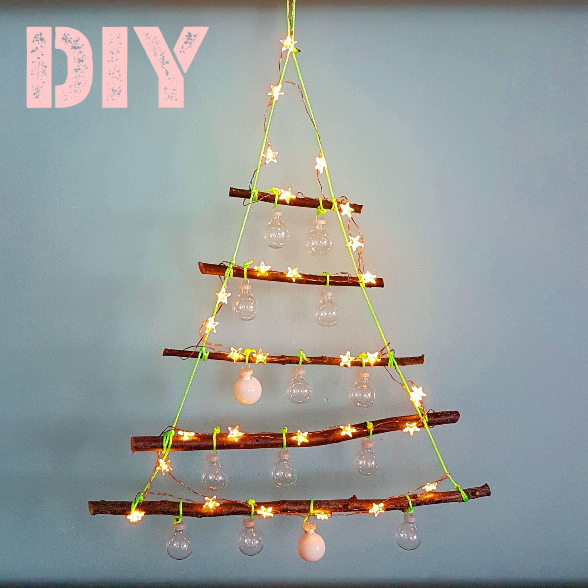 Kerst DIY: alternatieve kerstboom lichtjes van takken Leuk met kids